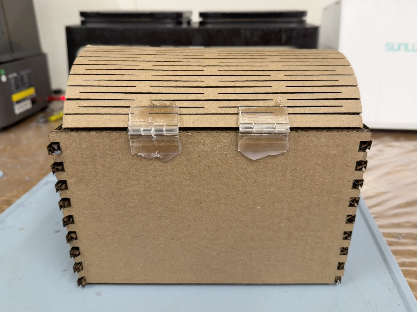 Back view of the final treasure chest box showing the plastic hinges