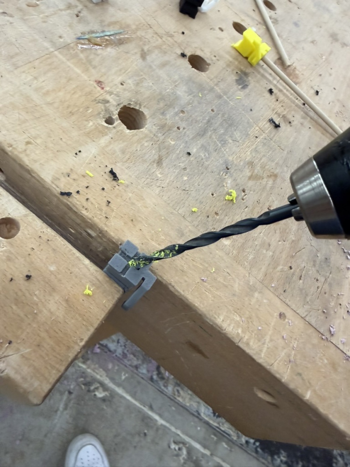 Drilling a 5 mm hole into the bottom of a calibration cat