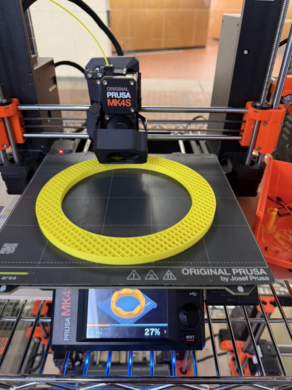 Yellow wavy base printing on the Prusa 3D printer
