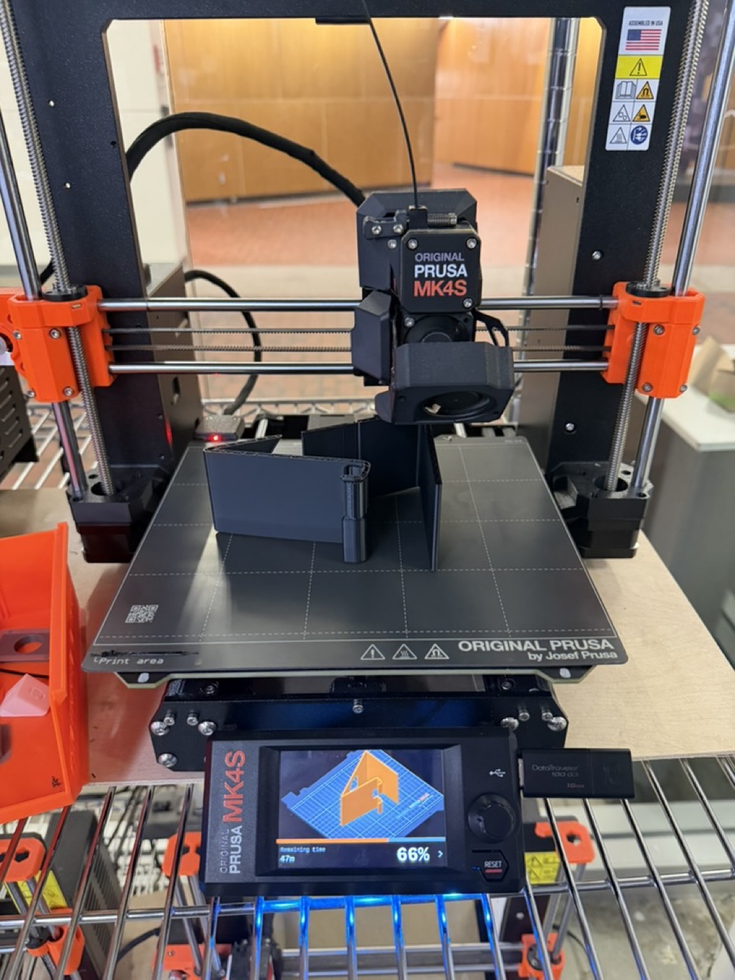 Black iPhone stand printing on a Prusa MK4S