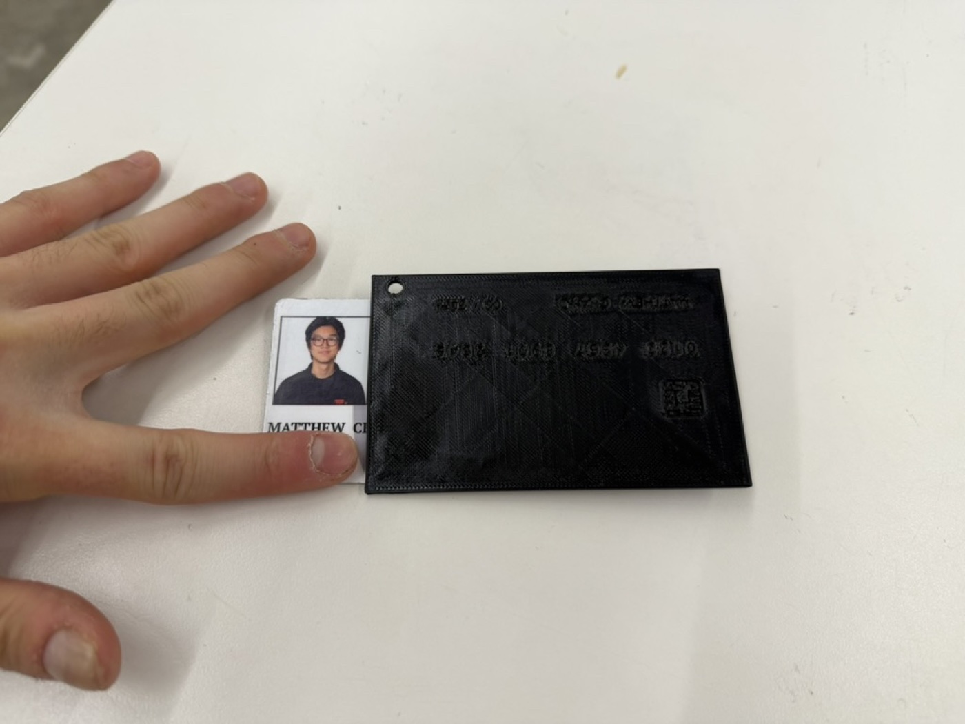 Keycard sliding into the finished 3D printed holder