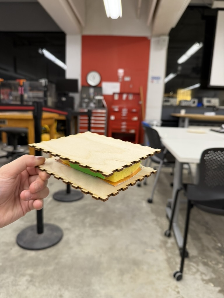 Assembled sponge capacitive weight sensor with plywood plates ready for measurement