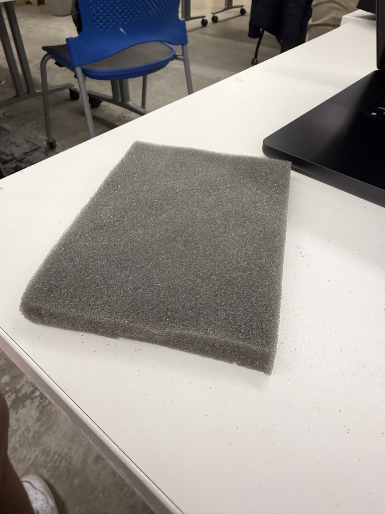 Gray foam pad considered for the capacitive weight sensor