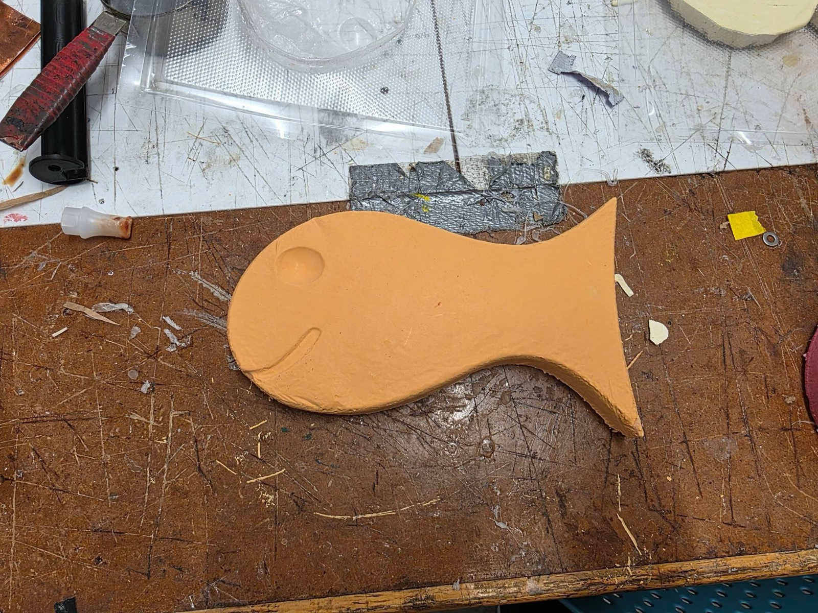 Finished orange plaster goldfish named Bob