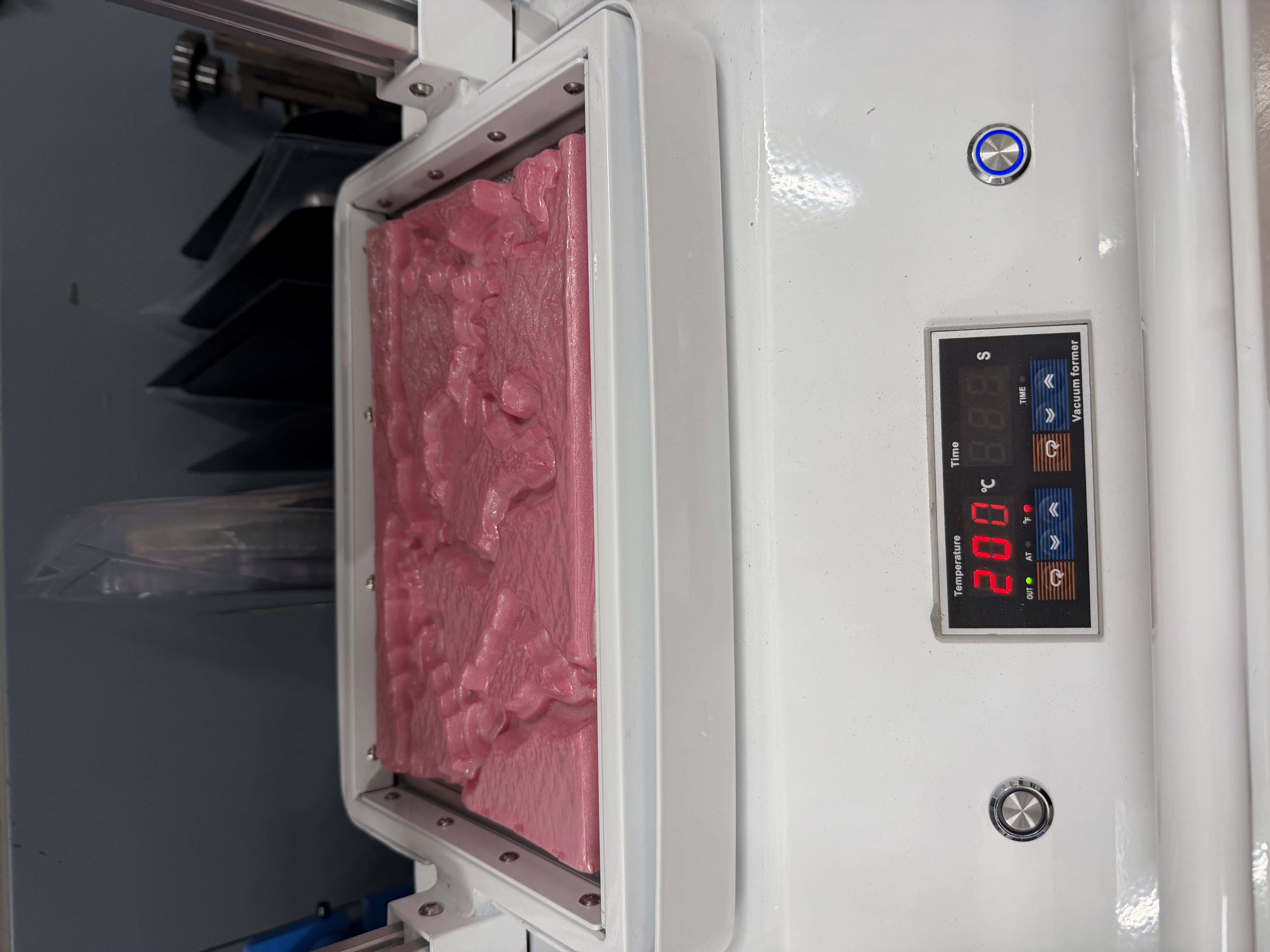 Vacuum forming a plastic mold onto the world map foam board