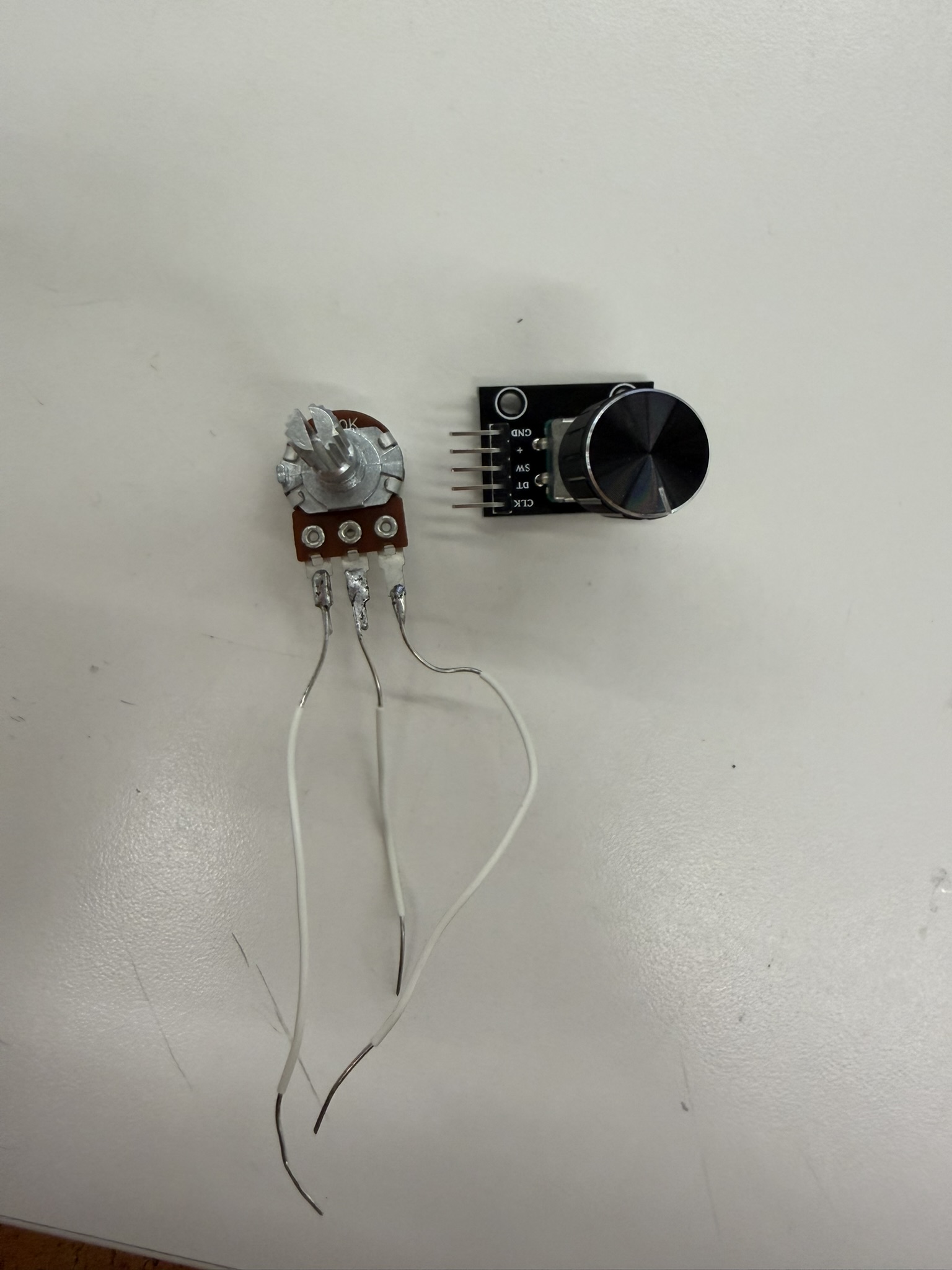 Potentiometer and rotary encoder used for volume control